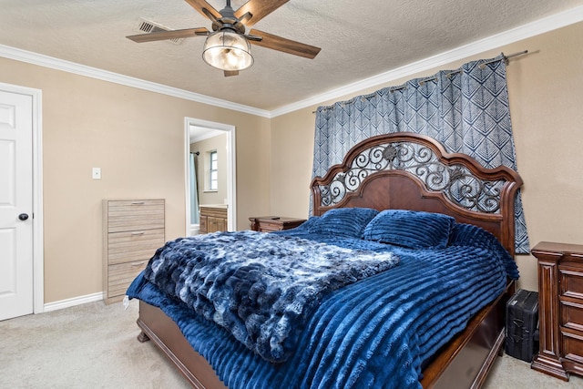 carpeted bedroom with crown molding, connected bathroom, ceiling fan, and a textured ceiling