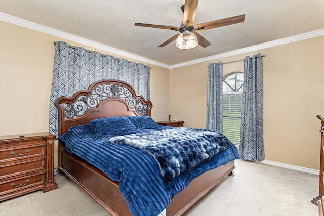 carpeted bedroom featuring crown molding, ceiling fan, and a textured ceiling