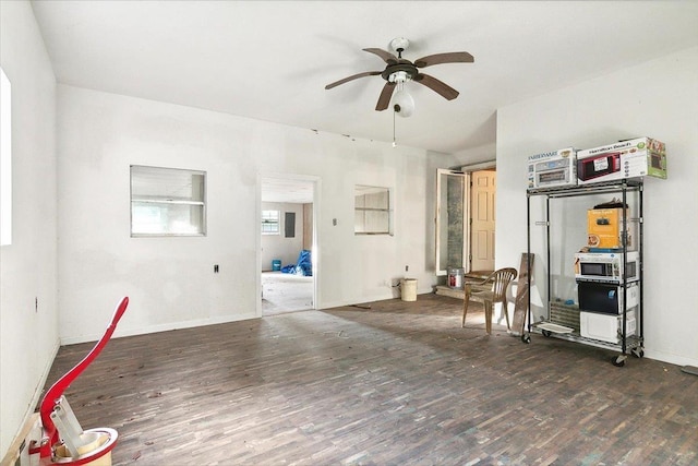 interior space with dark hardwood / wood-style floors and ceiling fan