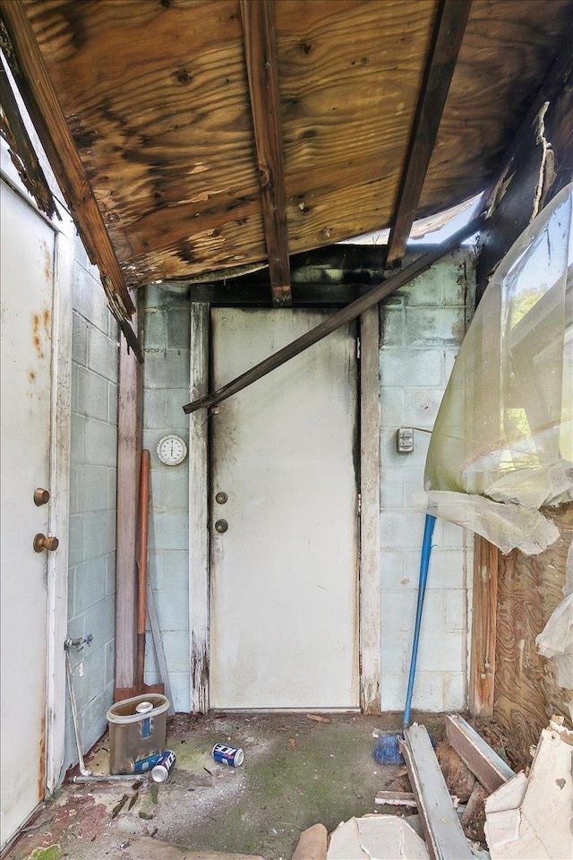 interior space featuring wooden ceiling