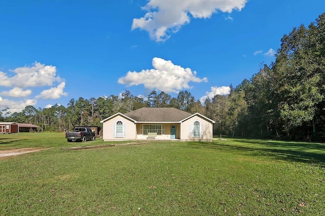 view of front of home featuring a front yard and a porch