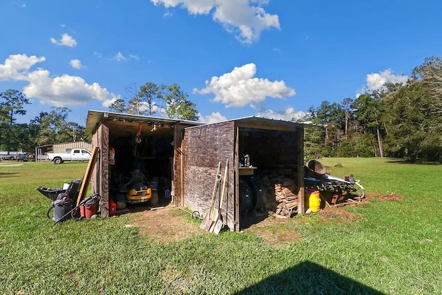 view of outdoor structure with a yard