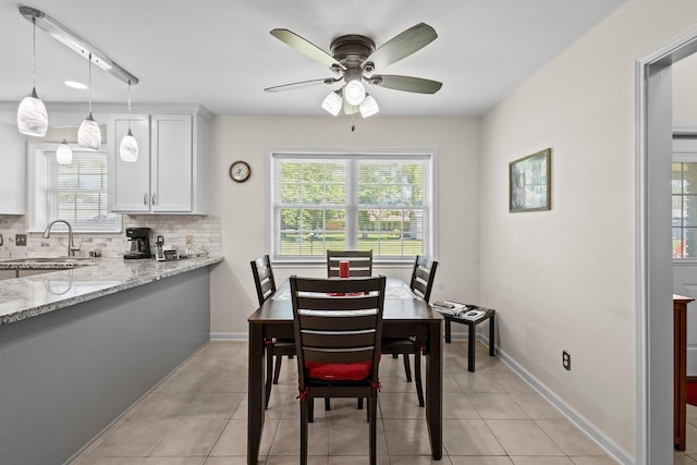 16 Enchanted Oaks St, Orange, TX 77630 - dining room with a ceiling fan and light tile patterned flooring