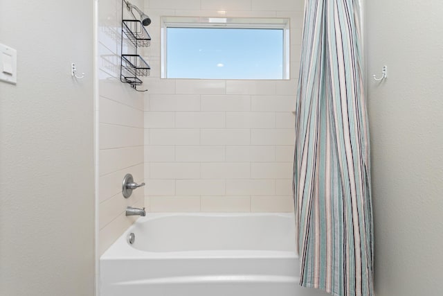 bathroom featuring shower / tub combo