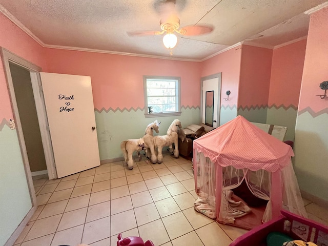 7521 Puntes Ln, Silsbee, TX 77659 - dining room featuring light tile patterned flooring, a textured ceiling, ornamental molding, and ceiling fan