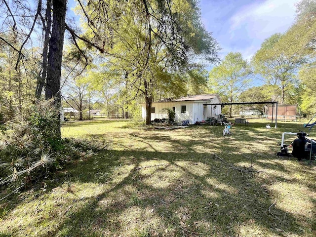 7521 Puntes Ln, Silsbee, TX 77659 - view of yard