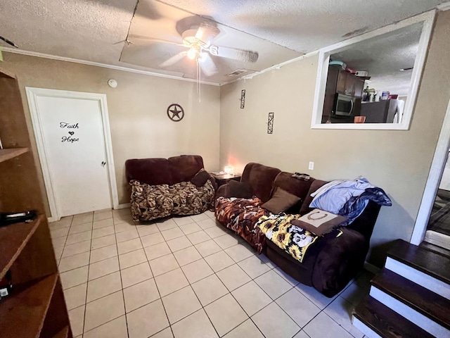 7521 Puntes Ln, Silsbee, TX 77659 - living room with light tile patterned flooring, a textured ceiling, crown molding, and a ceiling fan