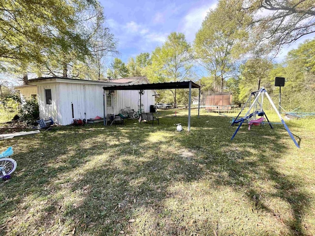 7521 Puntes Ln, Silsbee, TX 77659 - view of yard featuring a trampoline