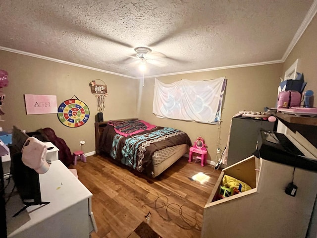 7521 Puntes Ln, Silsbee, TX 77659 - bedroom with a ceiling fan, wood finished floors, ornamental molding, and a textured ceiling
