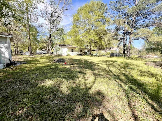 7521 Puntes Ln, Silsbee, TX 77659 - view of yard