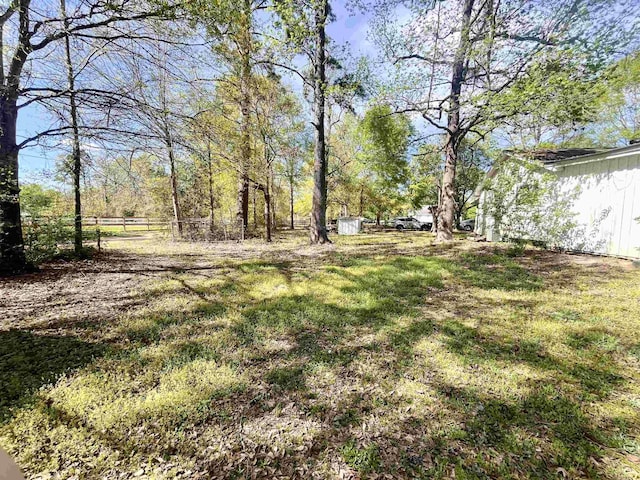 7521 Puntes Ln, Silsbee, TX 77659 - view of yard with fence