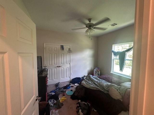 carpeted bedroom with ceiling fan