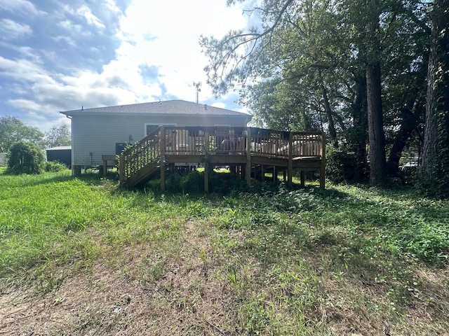 rear view of property with a deck