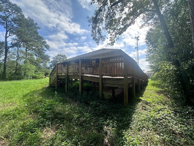 back of house with a wooden deck