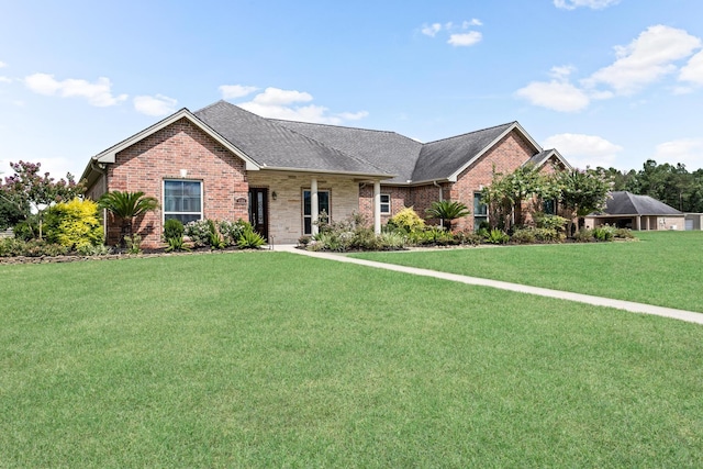 ranch-style home with a front lawn