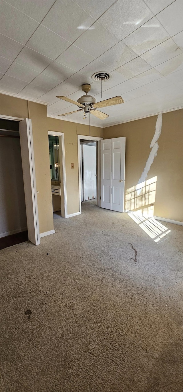 unfurnished bedroom with carpet floors