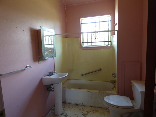 bathroom featuring toilet