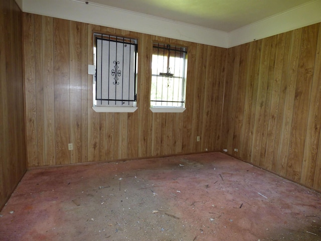 spare room with wooden walls