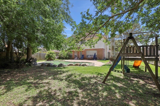 view of yard with a playground