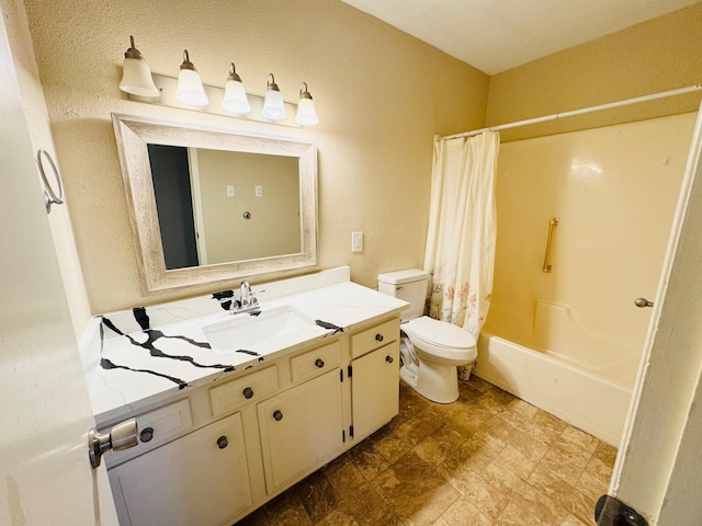 full bathroom with shower / bath combination with curtain, vanity, and toilet