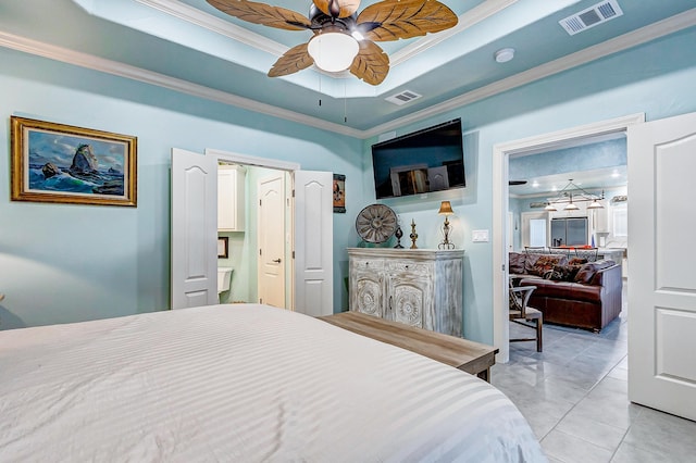 tiled bedroom with a raised ceiling, ceiling fan, and ornamental molding