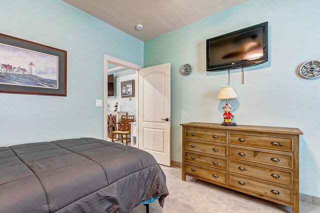 bedroom with light carpet