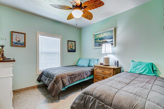 bedroom featuring ceiling fan