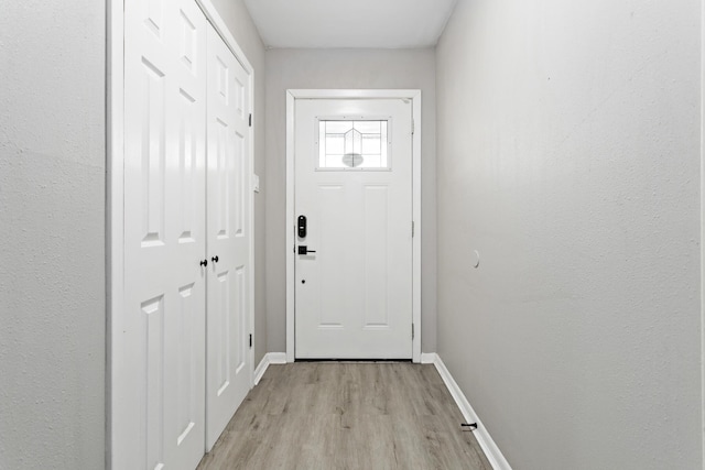 doorway to outside featuring light hardwood / wood-style flooring