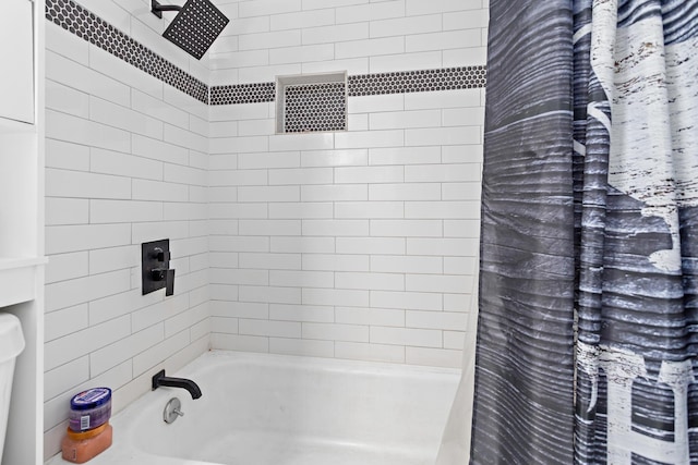 bathroom with shower / bathtub combination with curtain