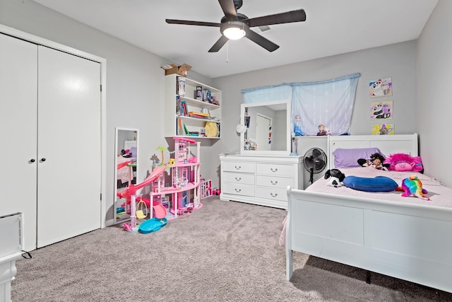 bedroom featuring ceiling fan, carpet floors, and a closet