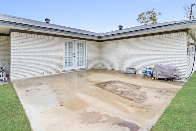 view of patio / terrace featuring area for grilling and french doors