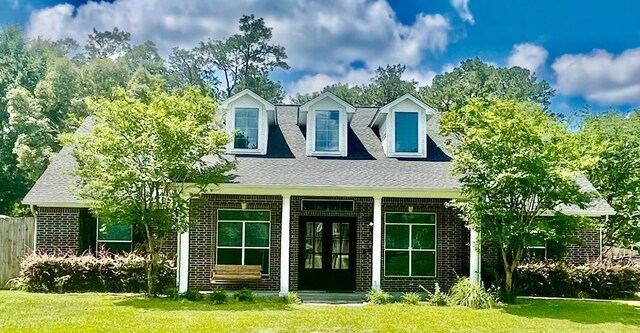 110 Cheltenham St, Lumberton, TX 77657 - view of front of property featuring brick siding and roof with shingles