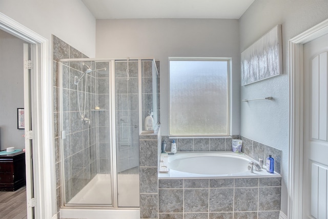 bathroom with plus walk in shower