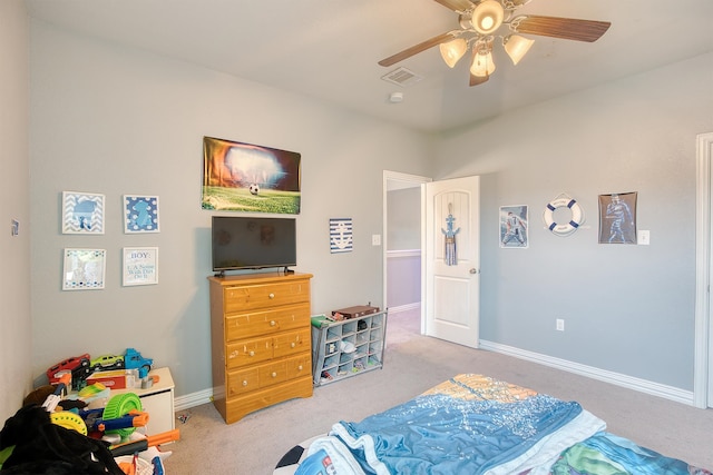 bedroom featuring ceiling fan and light colored carpet