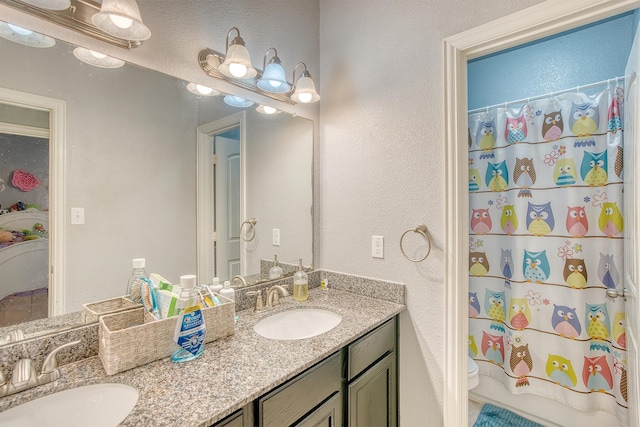 full bathroom featuring vanity, toilet, and shower / bathtub combination with curtain