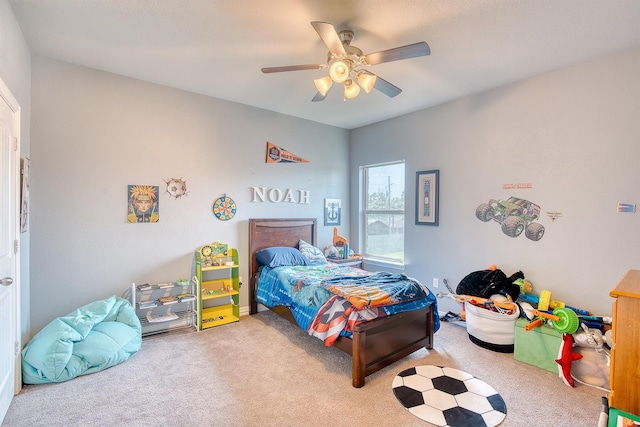 bedroom with carpet flooring and ceiling fan