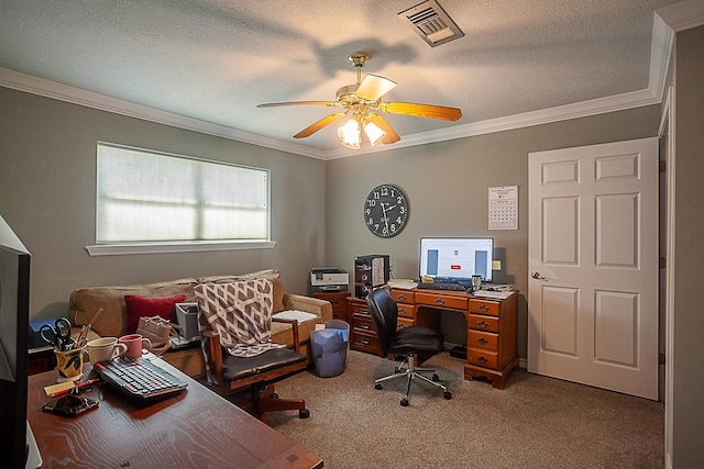 home office with carpet, visible vents, a textured ceiling, and ornamental molding