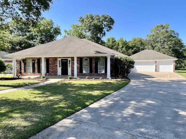 view of front of home with roof with shingles, brick siding, covered porch, a garage, and a front lawn