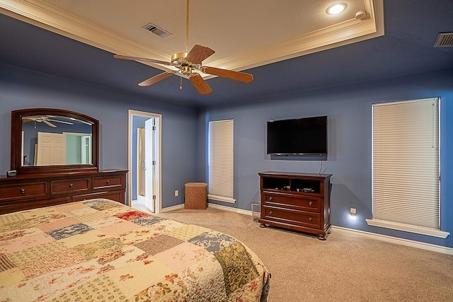 bedroom with carpet floors, visible vents, ornamental molding, a ceiling fan, and baseboards