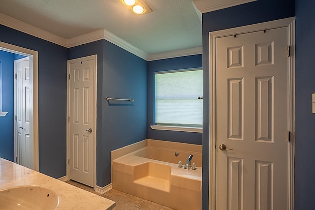 full bath featuring baseboards, tile patterned floors, a garden tub, a textured ceiling, and crown molding