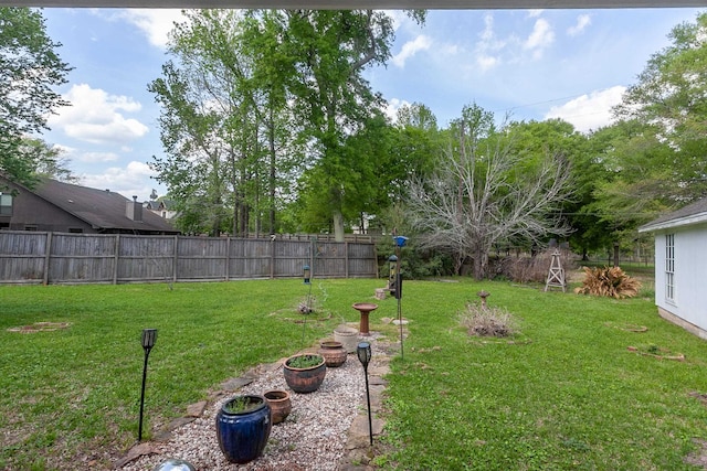 view of yard with fence