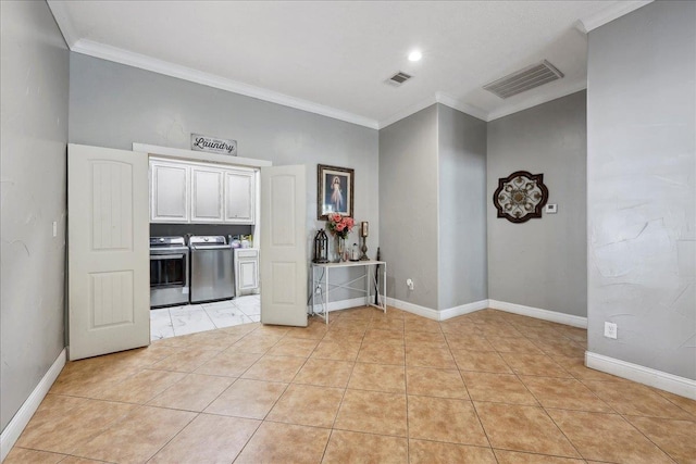 7645 Old Big Hill Rd, Beaumont, TX 77705 - empty room with washer and clothes dryer, crown molding, light tile patterned floors, and baseboards