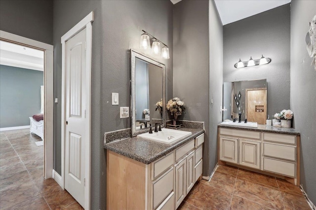 7645 Old Big Hill Rd, Beaumont, TX 77705 - full bath with two vanities and baseboards