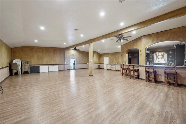 7645 Old Big Hill Rd, Beaumont, TX 77705 - workout area featuring a ceiling fan, recessed lighting, wood finished floors, arched walkways, and vaulted ceiling