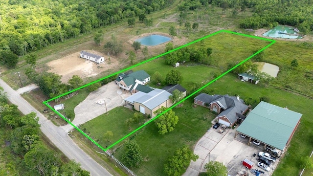 7645 Old Big Hill Rd, Beaumont, TX 77705 - aerial view of property's location with property parcel outlined and a forest
