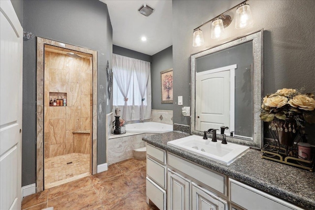 7645 Old Big Hill Rd, Beaumont, TX 77705 - full bath featuring a garden tub, walk in shower, vanity, and tile patterned flooring