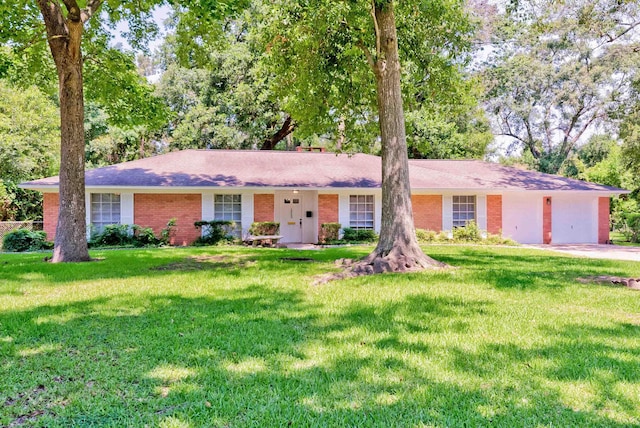 ranch-style house featuring a front lawn