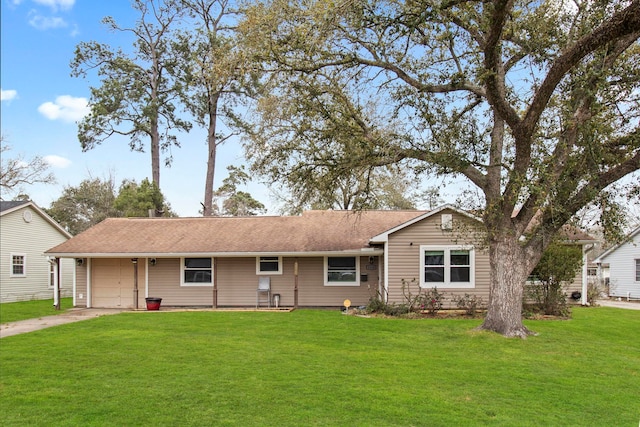 ranch-style home with driveway, a front lawn, an attached garage, and a shingled roof