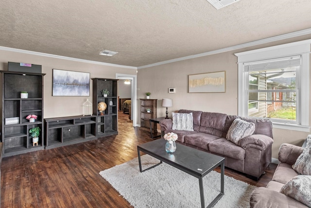 living area featuring visible vents, a textured ceiling, wood finished floors, and ornamental molding