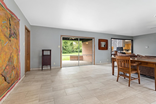 216 W Circuit Dr, Beaumont, TX 77706 - dining space featuring baseboards